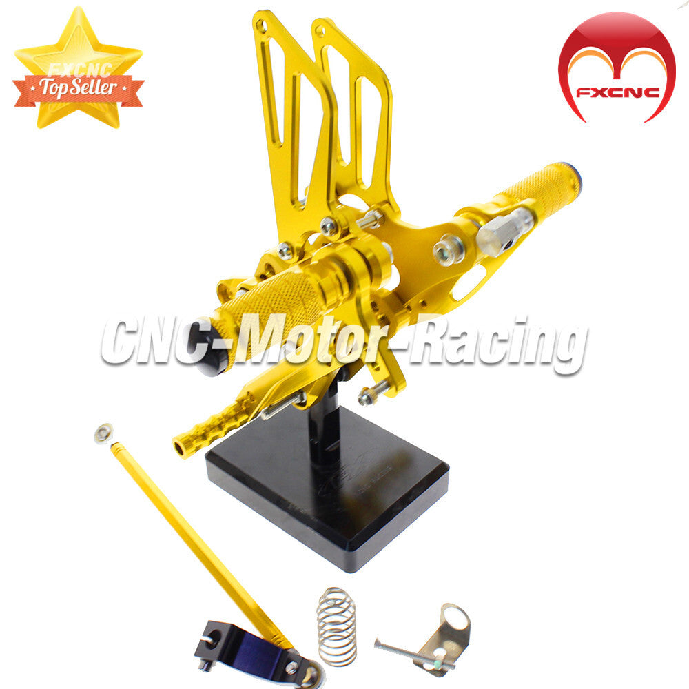 Adjustable rear wheel assembly with spikes and footrests suitable for CBR600F F4I 2001-2007 CNC machines.