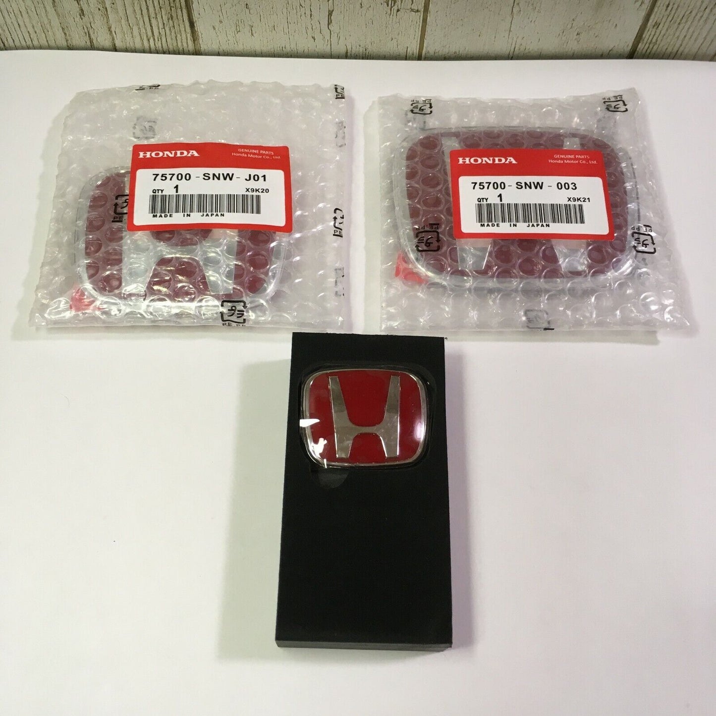 06-15 for Civic 4DR Sedan JDM, red H badges on front and rear steering wheels; 09-11 Fit (Jazz)