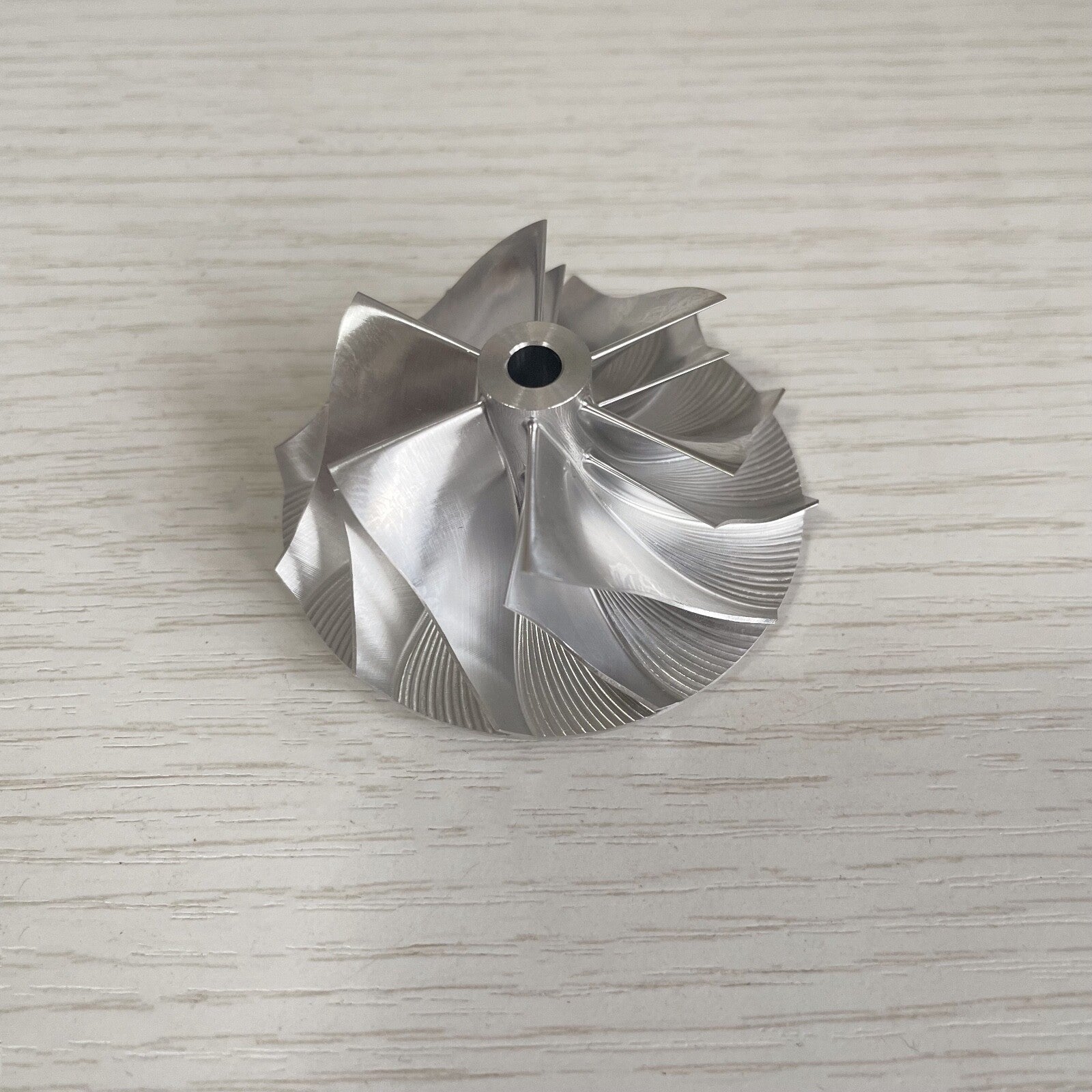 GTA15-25 42.00/56.02 mm 11+0 Blade Turbine Milling/Burnt Compressor Wheel