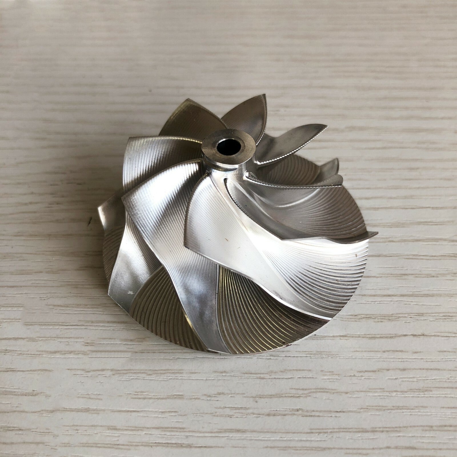 GT15-25 49.70/67.40 mm 8+0 insert spot milling, air profile blank compressor wheel