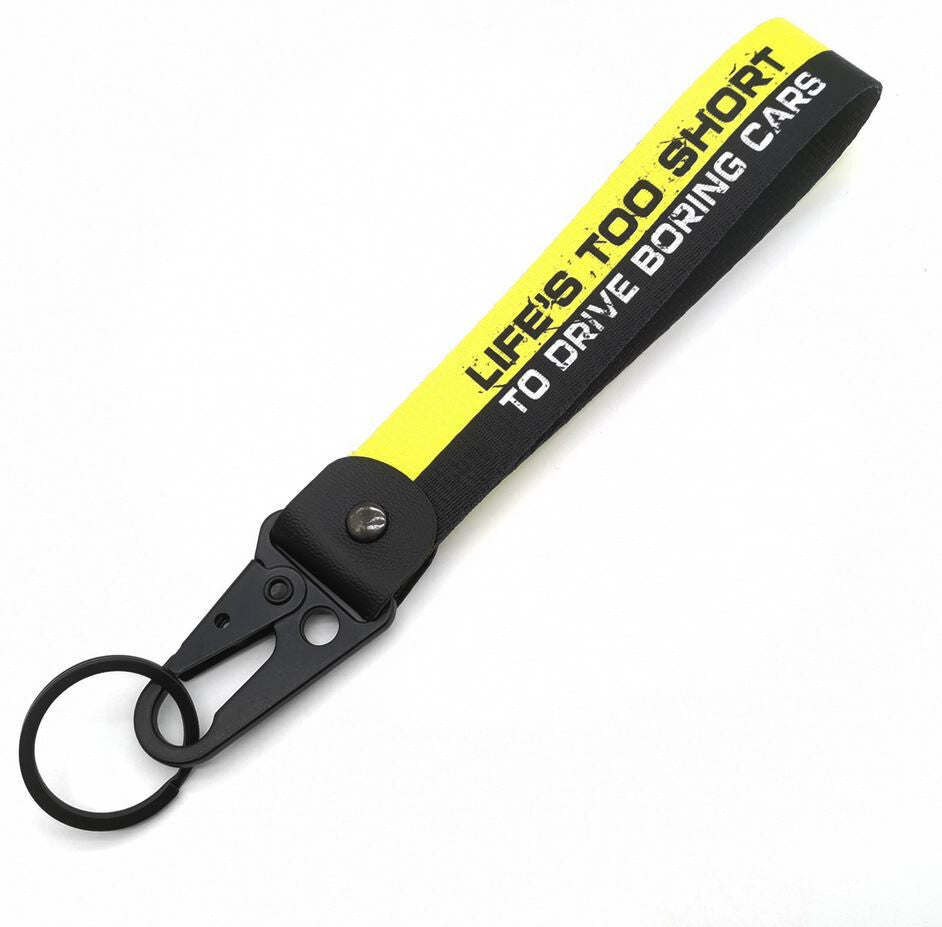 Car keychain/key ring with lanyard, car accessories, black and yellow, suitable for Nissan .