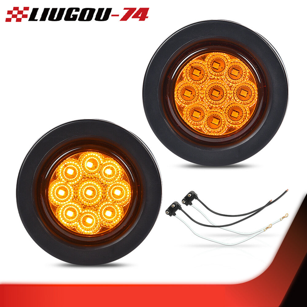 1 pair of amber 2-inch round 12-volt 9-LED side marker lights suitable for trucks, trailers, and caravans.