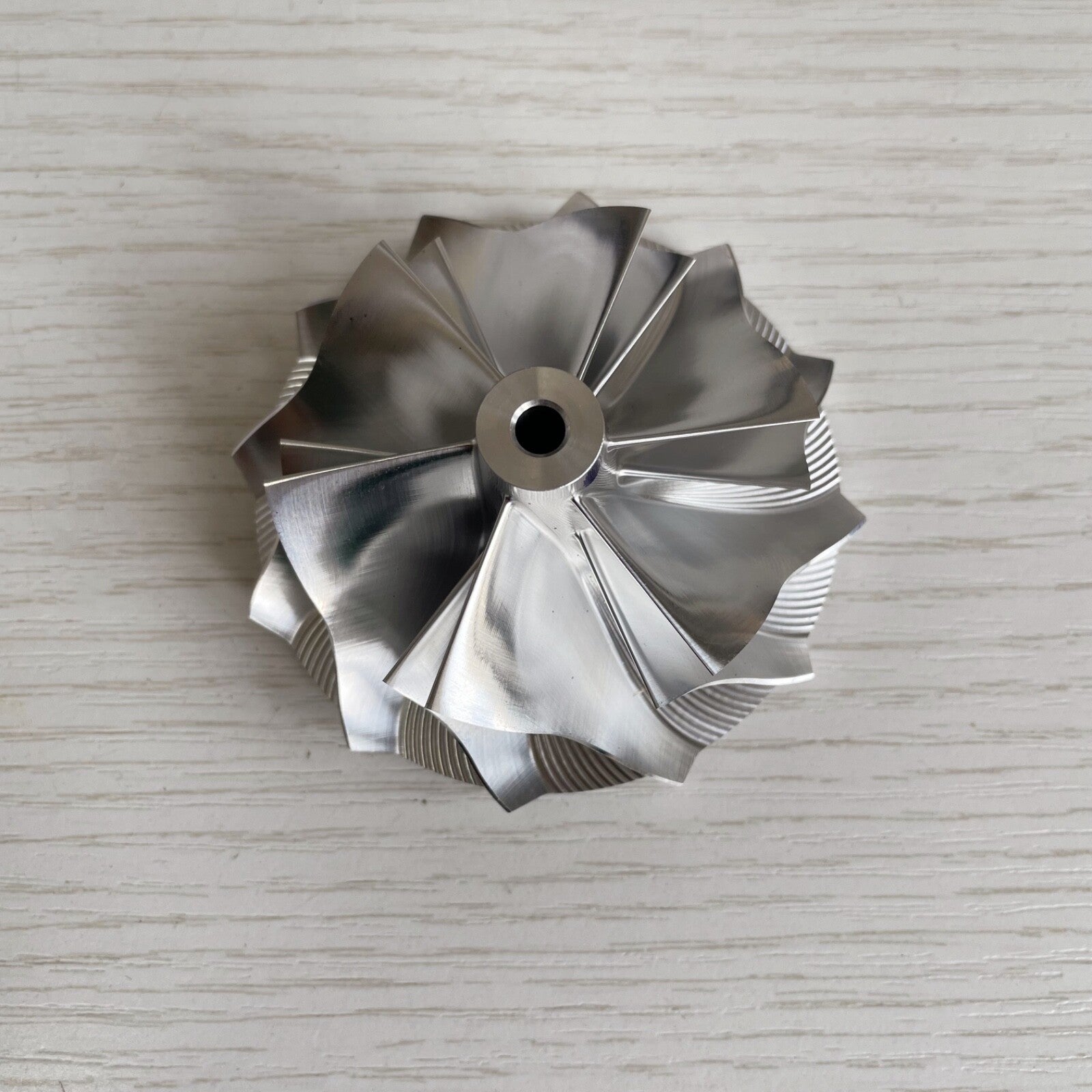 K04 54.20/66.56 mm 6+6 blade high-performance turbine blank compressor wheel 2.67