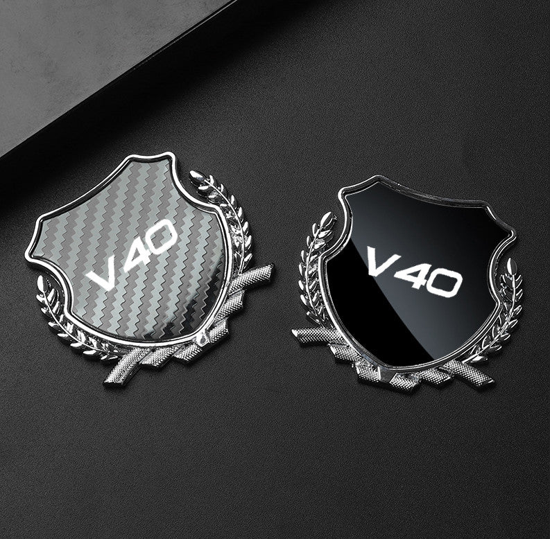 Black side fender and window badge decals for Volvo XC70 cars.