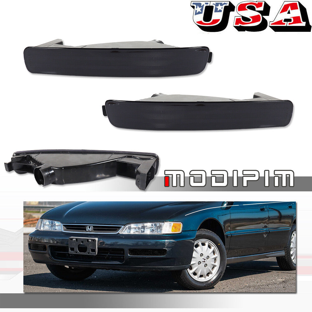 A pair of smoked lens signal bumper light housings for 1996-1997 for Honda Accord.