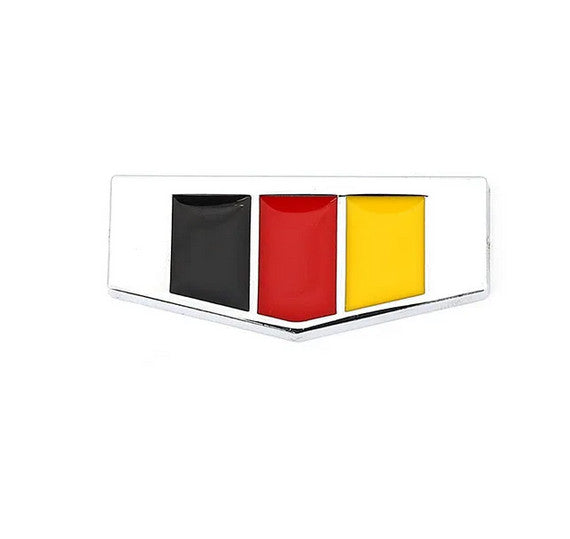 Silver metallic German flag badge sticker on the rear of the car's side fender and trunk.