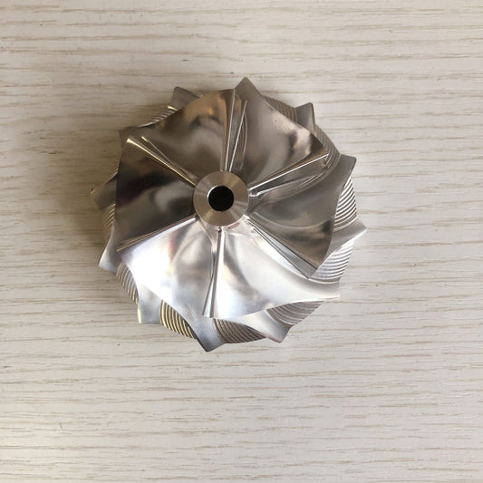 T04S 409535-0001 59.05/76.07 mm 6+6 Blade Turbine Milling/Blank Compressor Wheel
