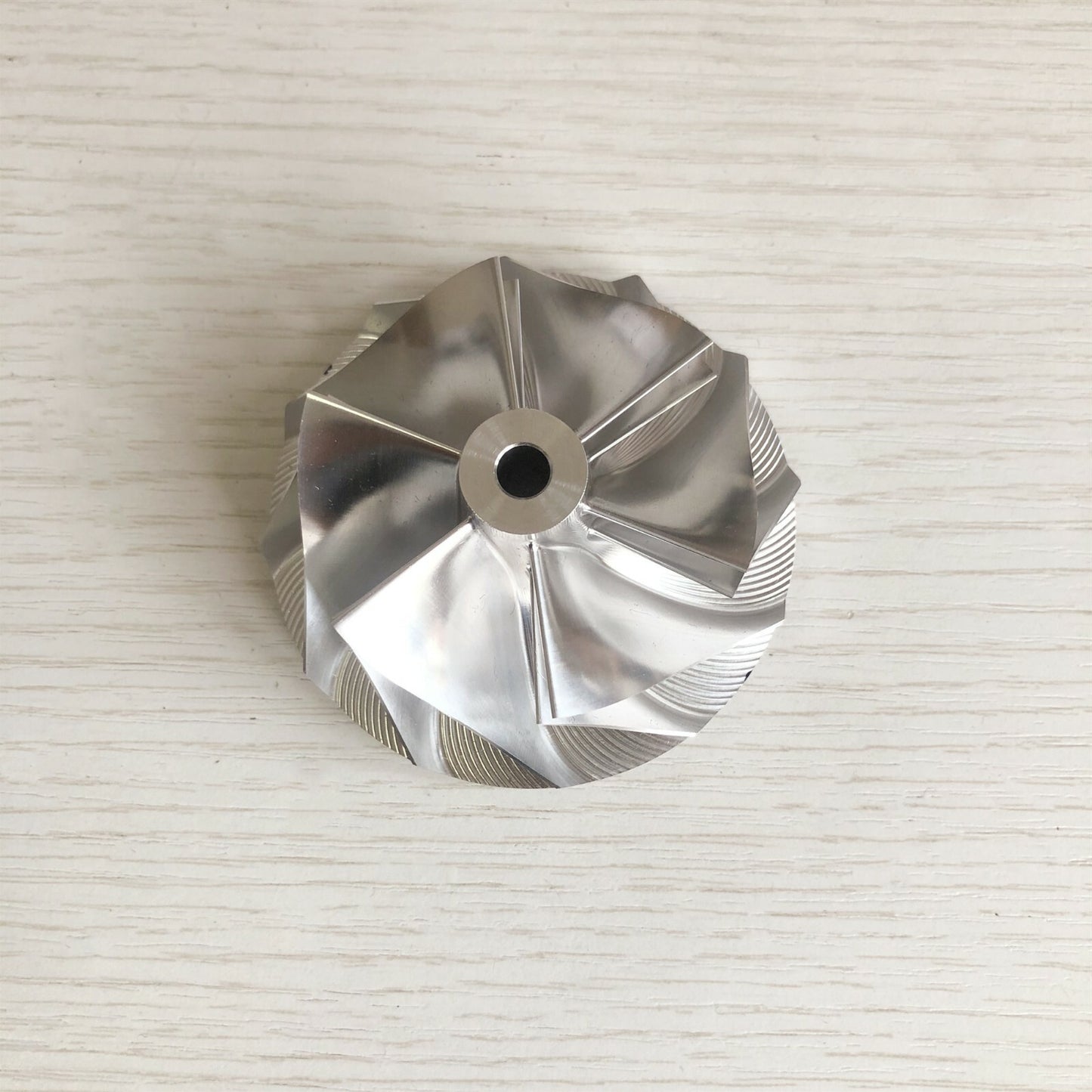 T04E 442476-0017 58.00/74.99 mm 6+6 Blade Turbine Blank Compressor Wheel