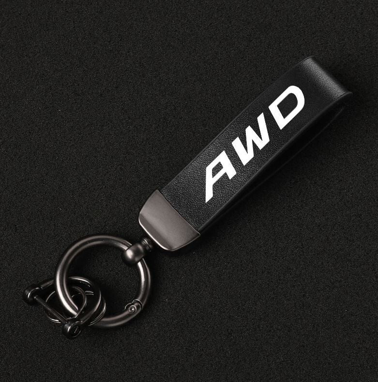 Black leather horseshoe buckle accessory for Volvo AWD car keychains/rings.