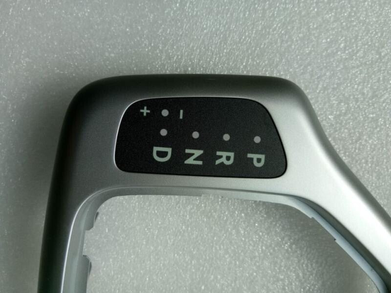 Center gearbox bezel for Jeep Cherokee 2014, 2015, 2016, and 2017 models (model 5YD27LS5AA) - Factory direct.